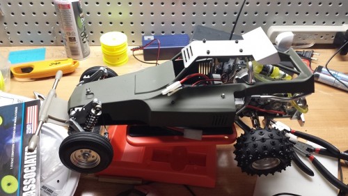 This guy has all metal gears, a Tamiya ball diff, and effective front suspension.  This is one of my bashers.  My other basher is a SuperShot re-re.