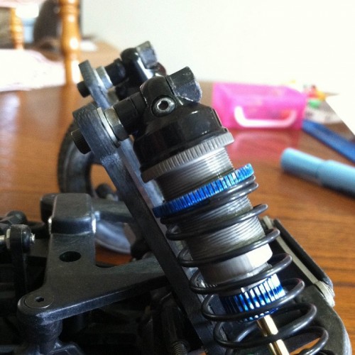 Added a spacer to just clear the shock tower