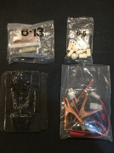 Some leftover original parts.  Mechanical speed controller in a bag never opened and original driver unpainted.