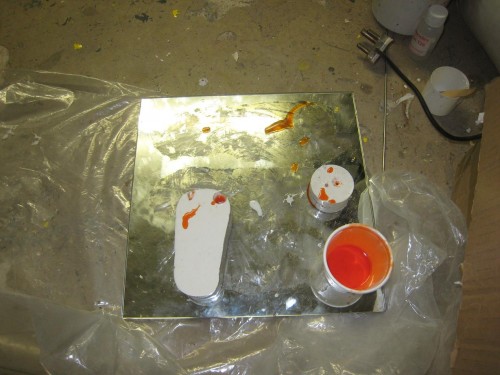 My silicon moulds with some orange coloured epoxy resin curing inside them